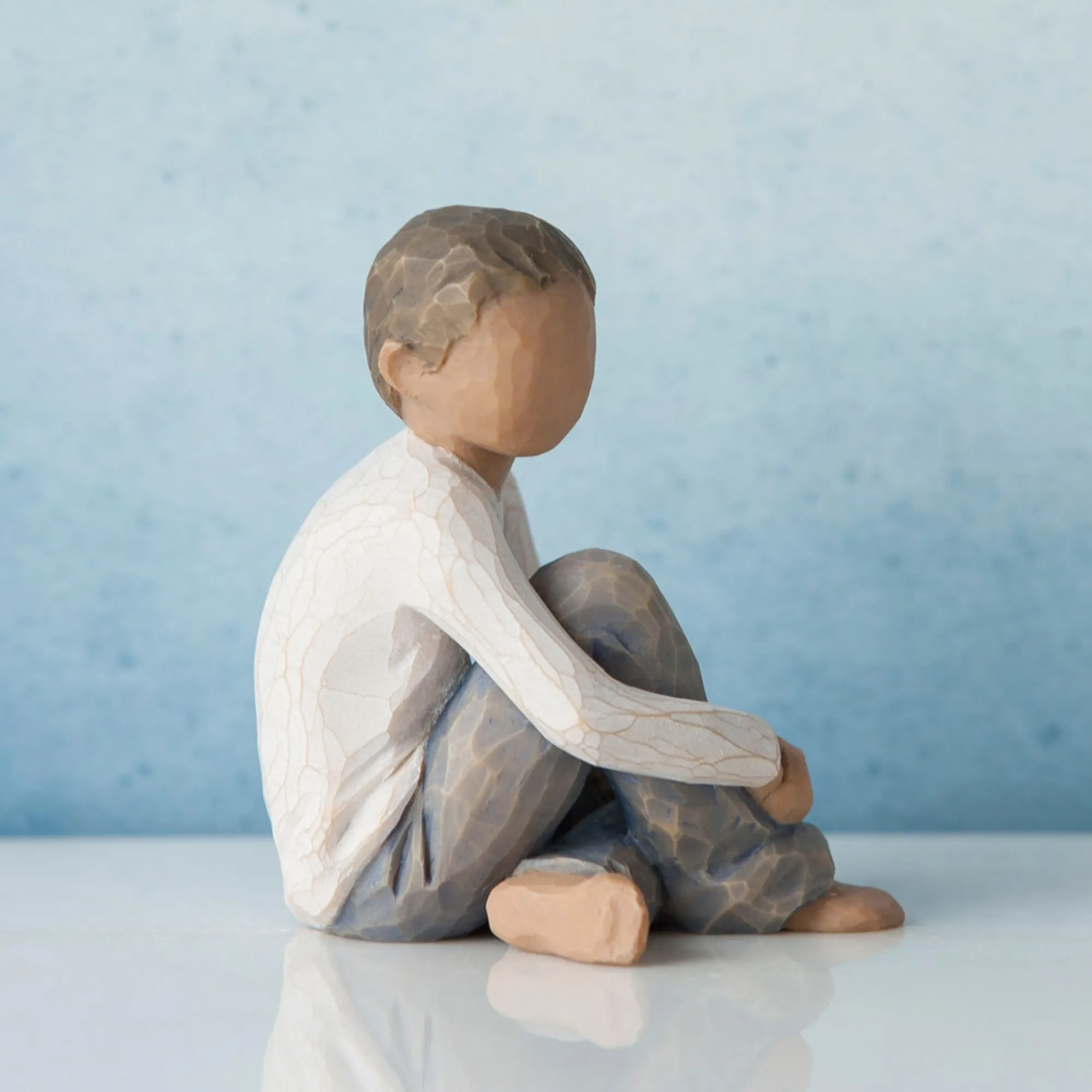 caring_child_darker_skin__1.webp Willow Tree Children | Caring Child (Darker Skin Tone And Hair Color)
