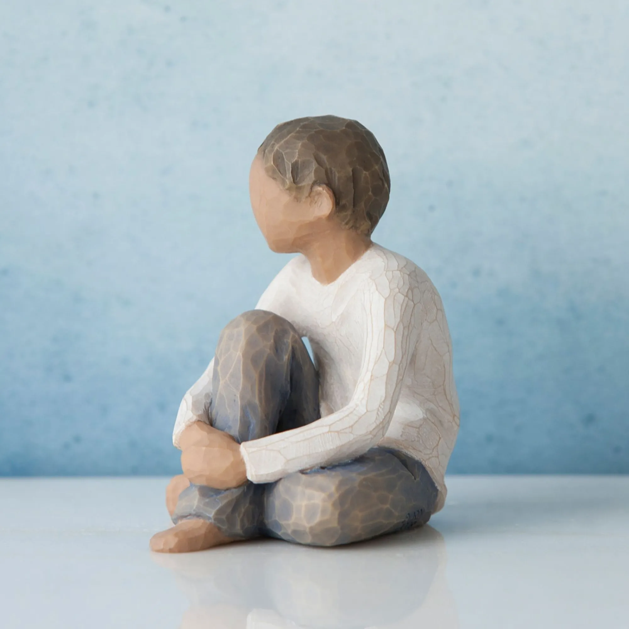 caring_child_darker_skin__3.webp Willow Tree Children | Caring Child (Darker Skin Tone And Hair Color)